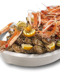 Bateau fruits de mer garni d’huîtres, gambas, langoustines, bulots et citron pour deux personnes
