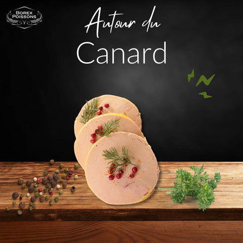 Slices of artisanal Foie Gras Chasselas with herbs and peppercorns on wooden board