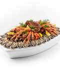 Bateau fruits de mer pour 2 personnes avec huîtres, gambas, langoustines, bulots, couteaux, amandes, bigorneaux et pinces de crabe fraîcheur garantie.