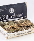 Caisse d'huîtres Gillardeau fraîches, produit d'exception de la mer française.