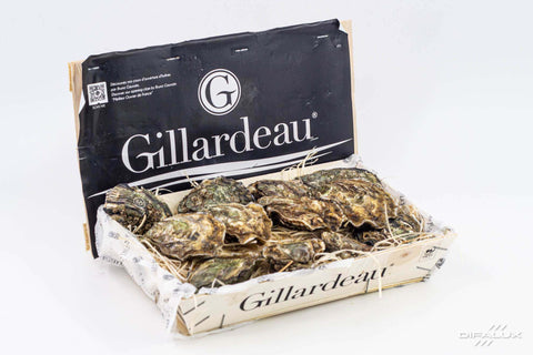 Caisse d'huîtres Gillardeau fraîches, produit d'exception de la mer française.